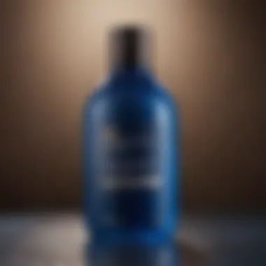 Close-up of blue shampoo bottle with key ingredients highlighted.