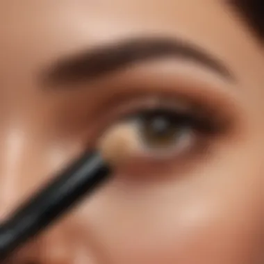 Close-up of a makeup brush applying foundation on a flawless skin.