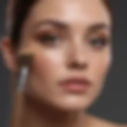 A woman applying light coverage foundation with a brush