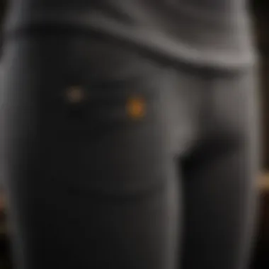 A close-up of fleece lined leggings demonstrating the warm interior and pocket accessibility.