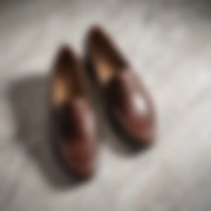 Classic leather loafers on a marble surface