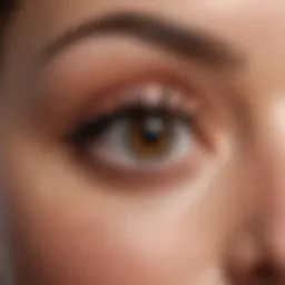 A close-up of a luxurious tube of waterproof mascara showcasing its elegant design.