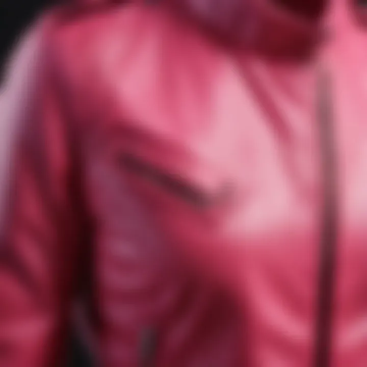 Close-up of the fabric texture of a hot pink moto jacket